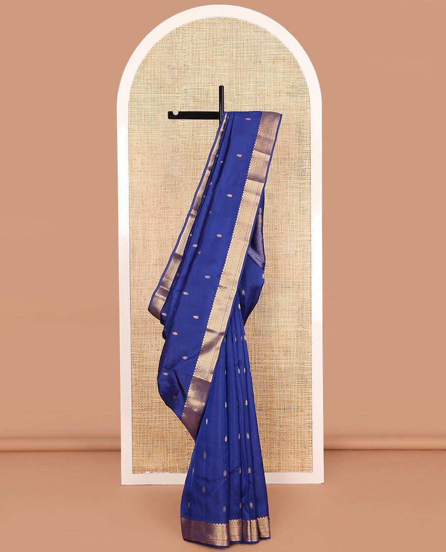 Blue zari buttas Vasundhara silk mix saree, zari border of manga mokku, muthu, neli, kamalam, and ara maadam, and pai yaadi kattam pallu
