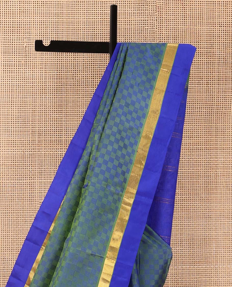 Blue paiyadi kattam Kanchipuram silk saree, contrast border of muthu, and vanki designs, and zari striped pallu
