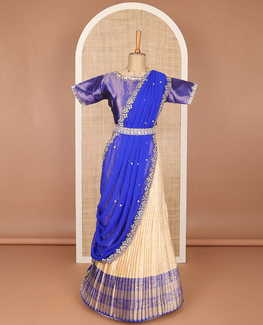 Cream half saree with contrast intricate zari design order, embroidered blouse & floral embroidery, scallop border dhavani