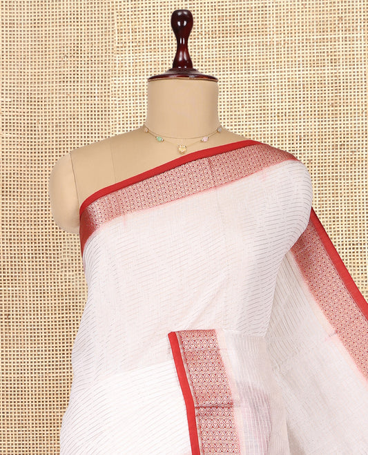 White Assam Silk Saree, Accentuated with Zari Stripes, Complemented by Contrast Zari Border,  Zari Woven Pallu, and Contrast Blouse