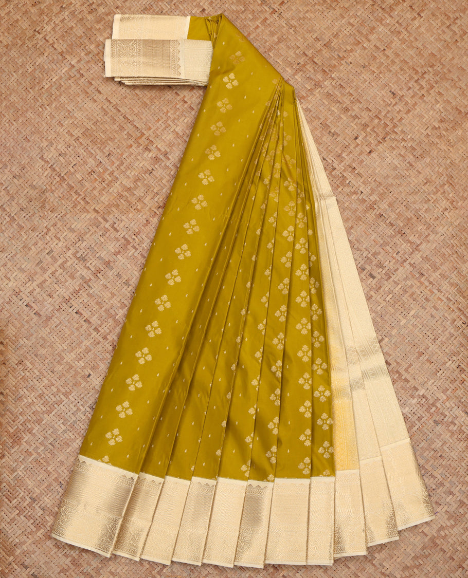 Green Budget Silk Saree, Styled with Zari Buttas , Complemented by a Contrast Traditional Zari Border, Grand Pallu, and Contrast Blouse