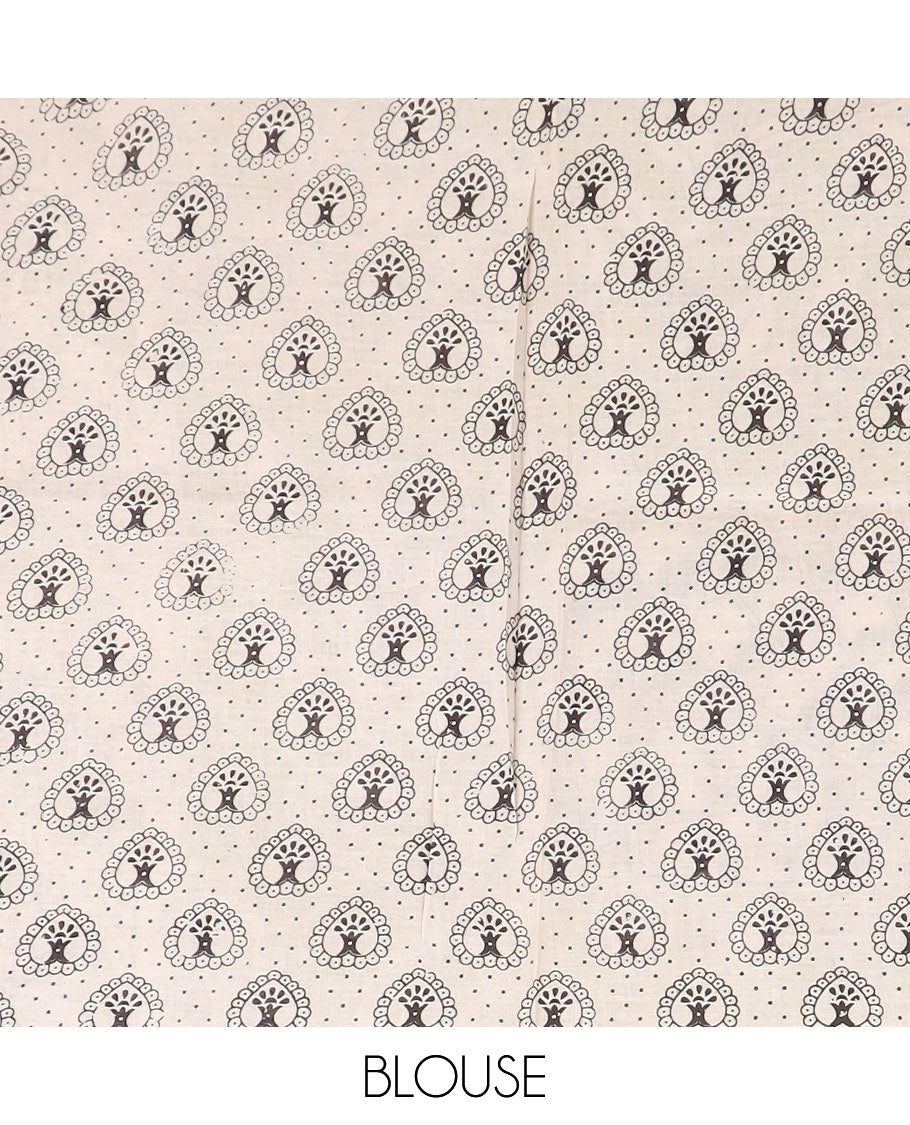 Green floral machine-printed cotton saree, contrast printed border, and pallu of Kalamkari floral and peacocks