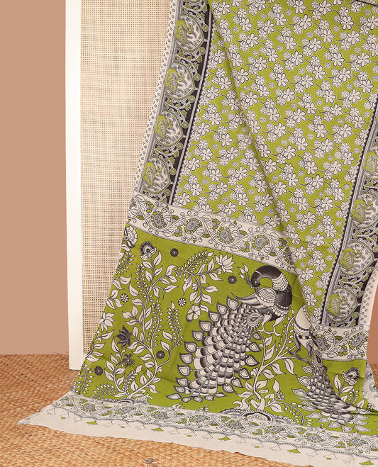 Green floral machine-printed cotton saree, contrast printed border, and pallu of Kalamkari floral and peacocks