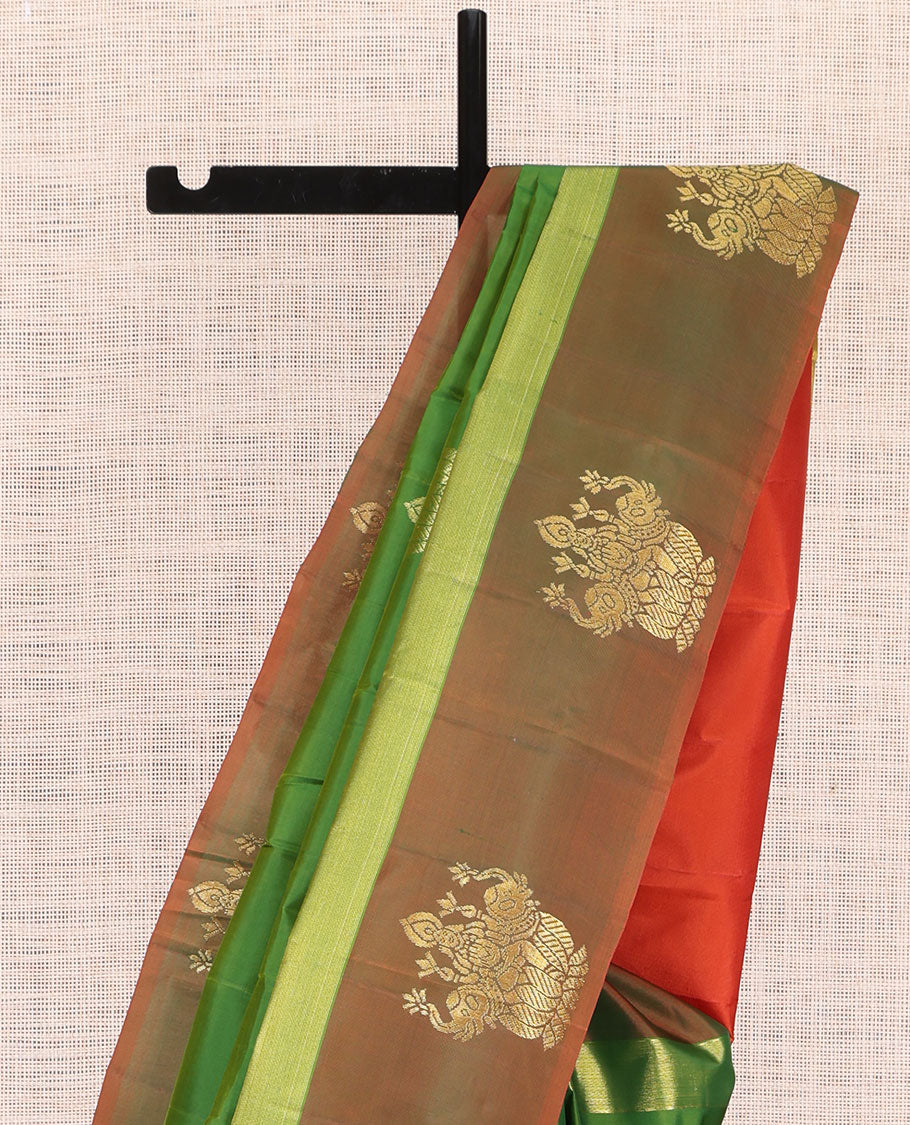 Green Kanchipuram Silk Saree, Woven with Goddess Lakshmi Buttas, a Contrast Goddess Lakshmi Border, Goddess Lakshmi Pallu, and a Contrast Blouse