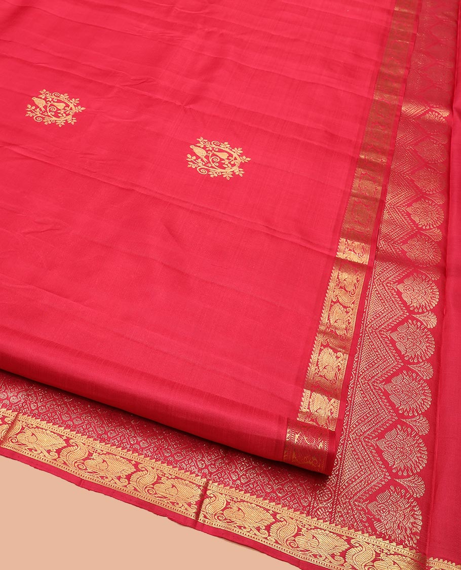 Red Kanchipuram Silk Saree Accentuated with Zari Buttas, Highlighted with Zari Border of Ara Bogudi, Muthu, and Mayil Designs, Grandly Woven Pallu of Jaal Designs, and Paired with a Matching Blouse