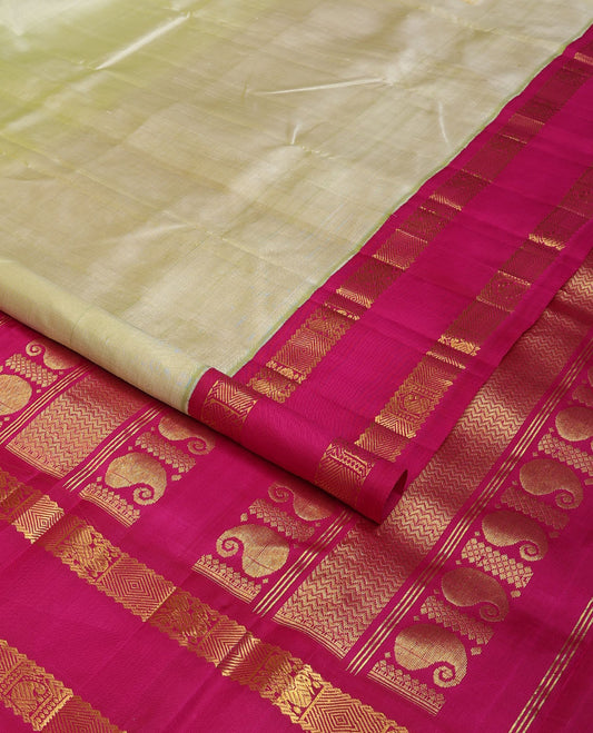 Pastel green Kanchipuram silk saree, contrast rettai pettu korvai one-sided border of rekku,mayil,manga & diamond designs & pallu of vanki & manga designs