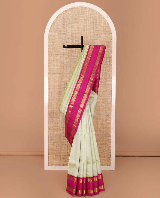 Pastel green Kanchipuram silk saree, contrast rettai pettu korvai one-sided border of rekku,mayil,manga & diamond designs & pallu of vanki & manga designs