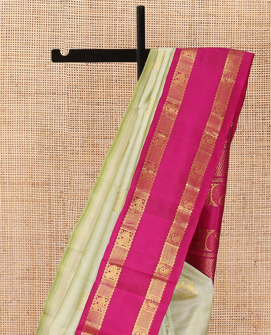 Pastel green Kanchipuram silk saree, contrast rettai pettu korvai one-sided border of rekku,mayil,manga & diamond designs & pallu of vanki & manga designs