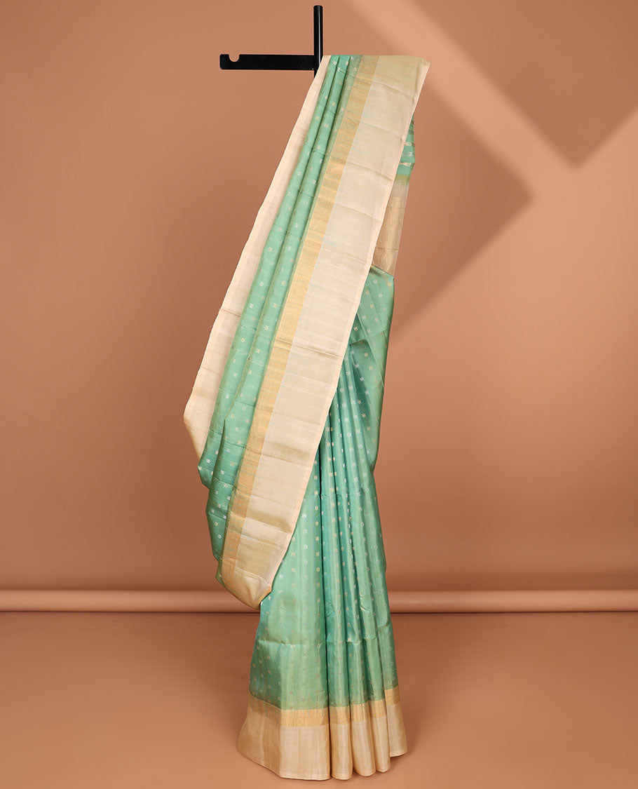 Green small buttas soft silk saree with contrast intricate zari border & geometric zari design pallu