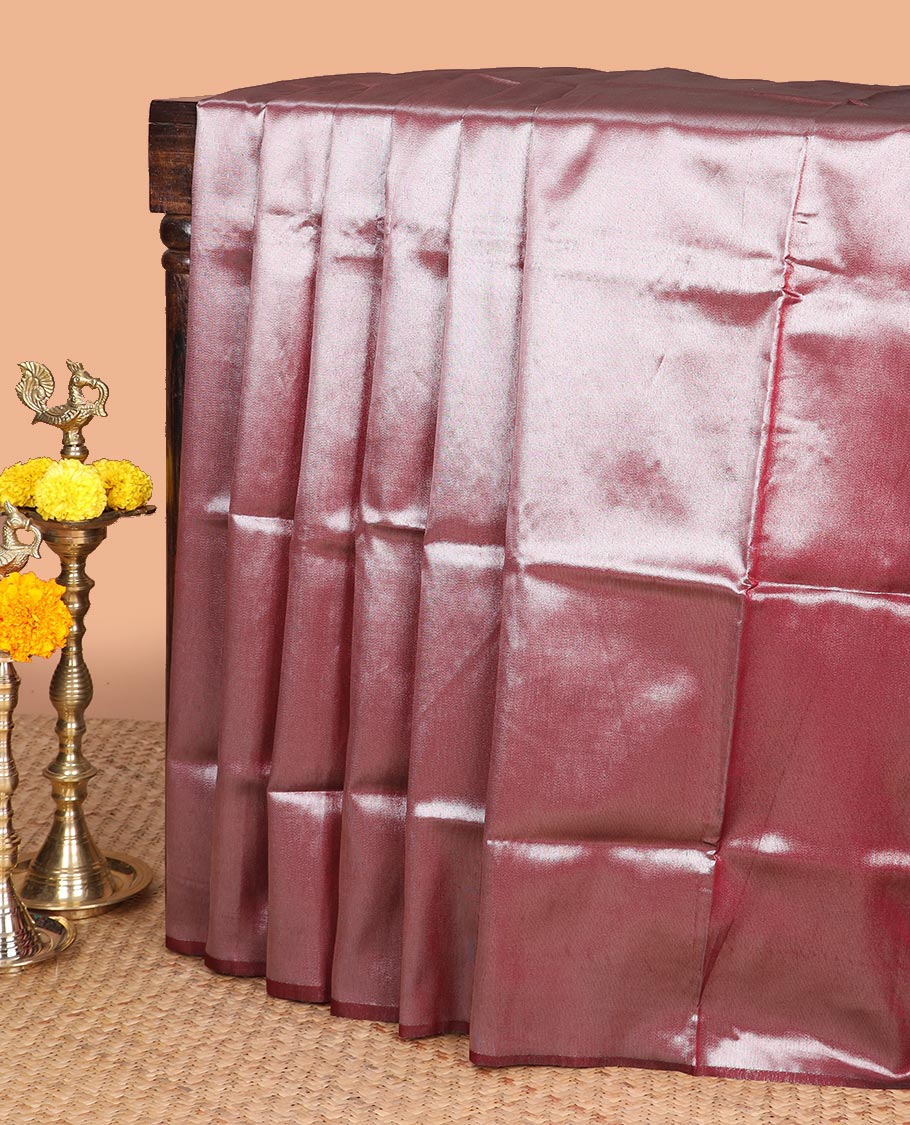 Maroon silver zari tissue sailk saree with plain border & rich pallu along with butta design blouse