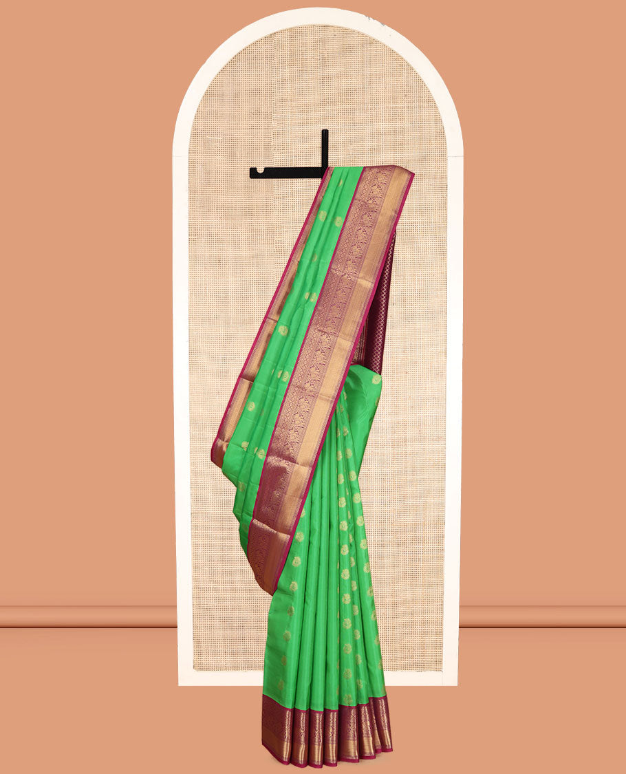 Green Vasundhara Lite Silk Mix Saree, Embellished with Zari Buttas, a Contrast Border of Banaras, Poun, Kamalam, Yaanai, and Mayil Kann Designs, Grand Pallu, and a Contrast Blouse