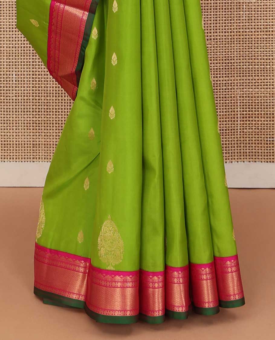 Parrot green zari buttas silk saree, contrast border of rekku, Muthu, poun, and mayil kann, and pallu of mayil kann and manga designs
