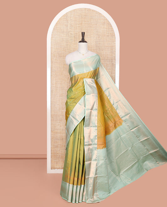 Green Budget Silk Saree, Decked Up with Zari Buttas All Over Its Body, Complemented by a Contrast Traditional Zari Design Border, Intricately Zari Designed Pallu, and Paired with a Contrast Blouse