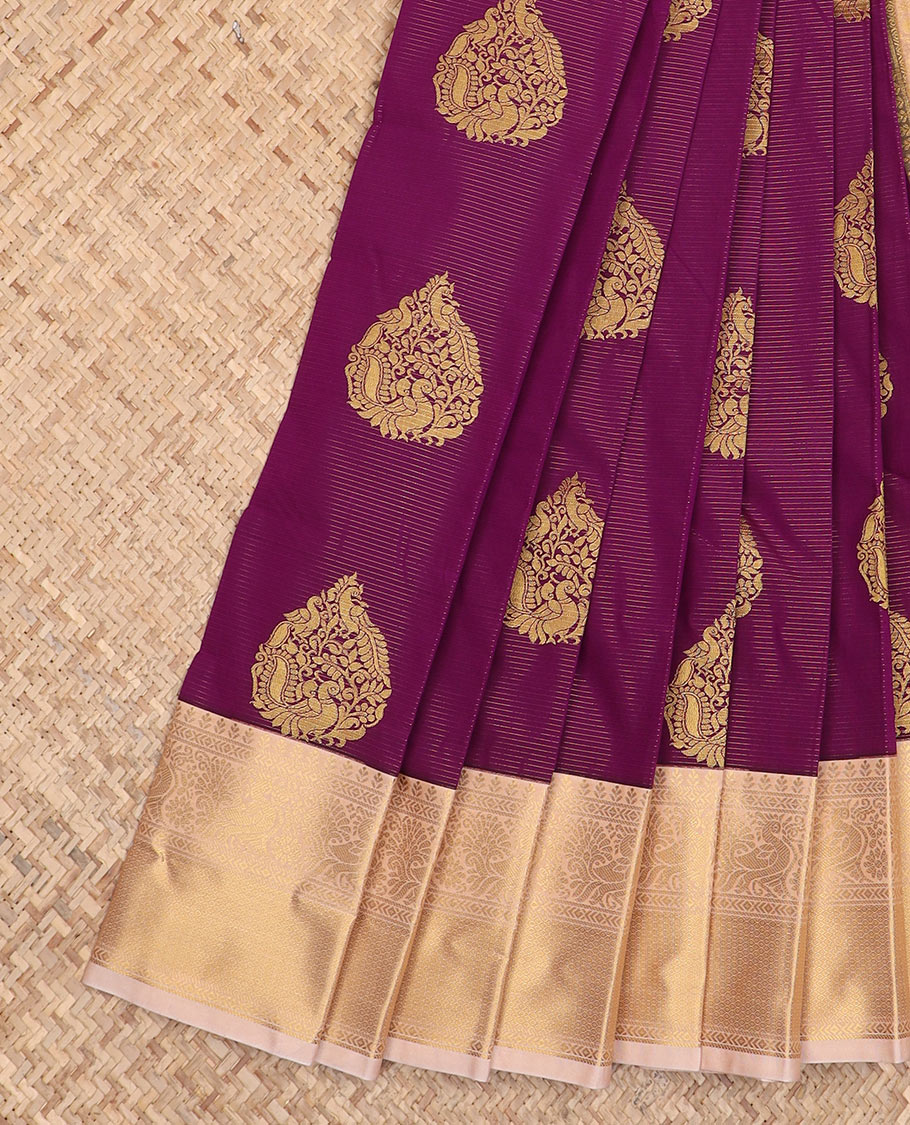 Purple zari buttas and striped gift saree, contraast traditional zari border, and pallu of jaal pallu