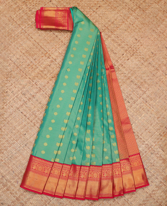 Green Budget Silk Saree, Gleamed Up with Peacock-Chakram Buttas, a Contrast Traditional Zari Border, Grand Pallu, and a Contrast Blouse