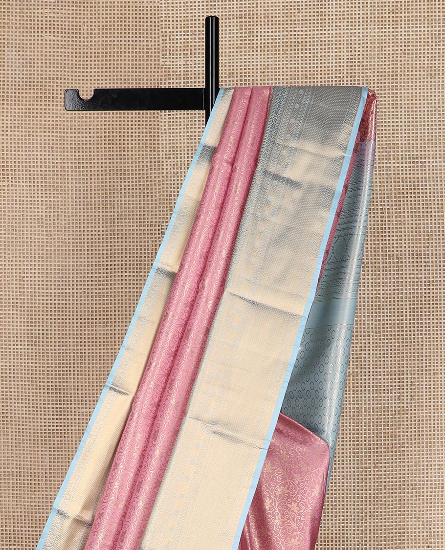 Pink jacquard budget silk saree, contrast traditional zari border, and traditional motifs steeped pallu