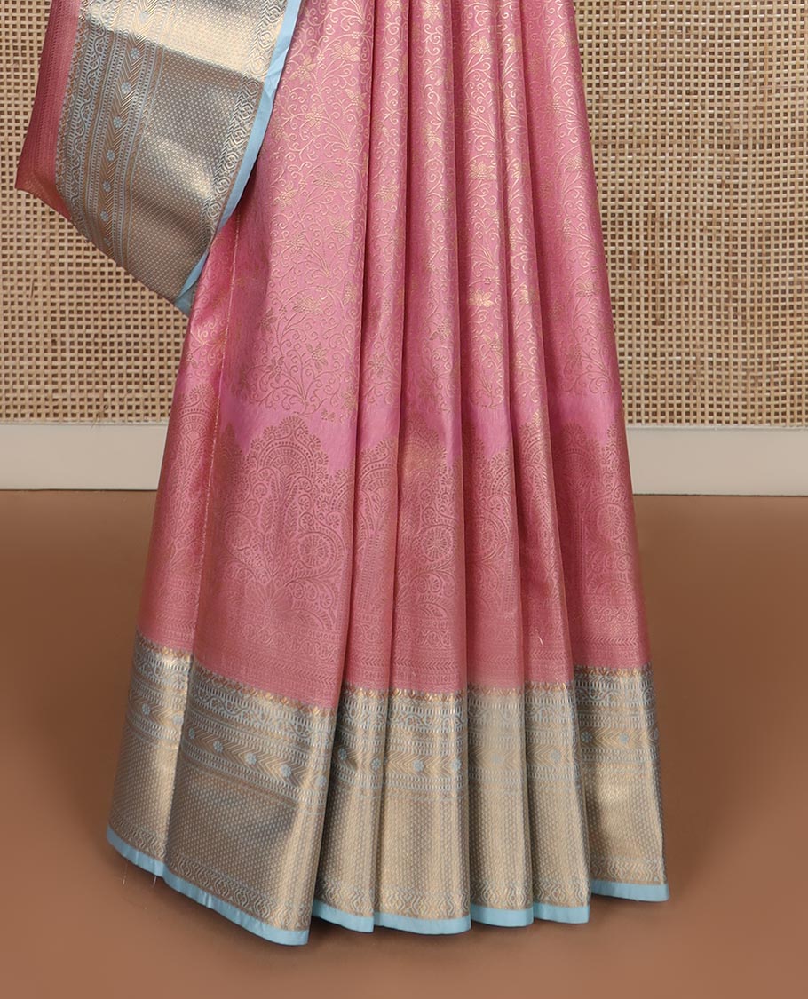 Pink jacquard budget silk saree, contrast traditional zari border, and traditional motifs steeped pallu