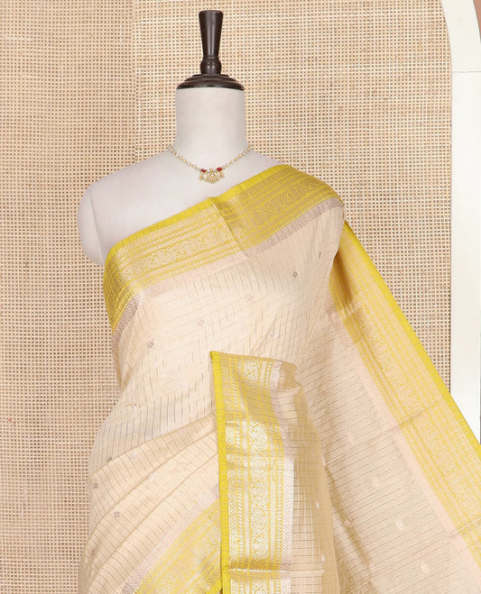 Sandal zari buttas and checks assam silk saree, contrast traditional zari border, and zari design pallu