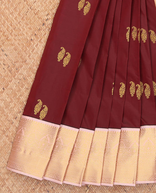 Maroon Budget Silk Saree, Elevated with Paisley Zari Buttas on Its Body, Complemented by Contrast Traditional Zari Design Border, Gleaming Zari-Woven Pallu, and Paired with a Contrast Blouse