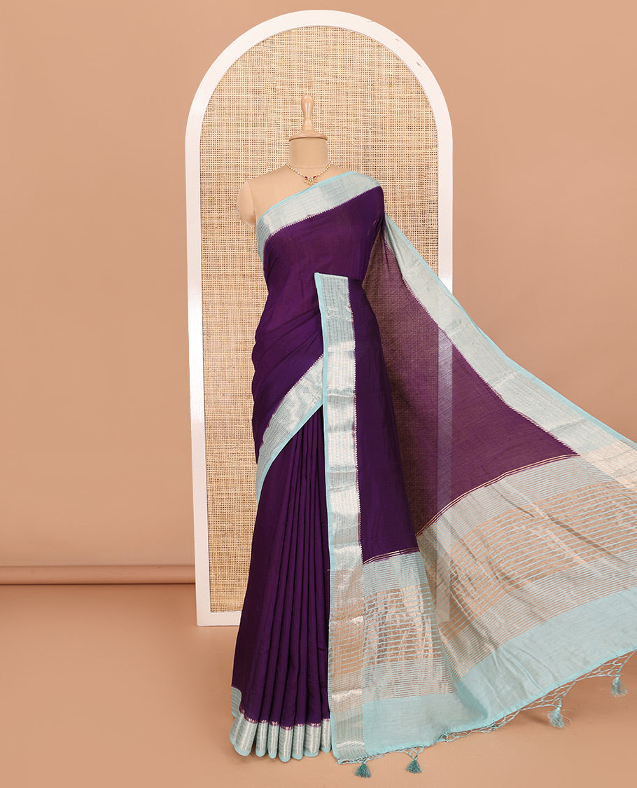 Eggplant Purple Plain Assam Silk Saree, Complemented by Contrast Traditional Zari Design Border, Pallu Trimmed with Zari Stripes, and Paired with a Contrast Blouse