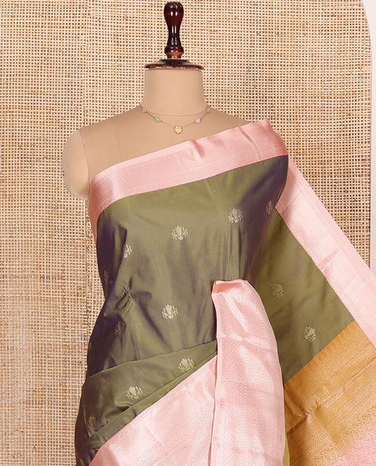 Green Budget Silk Saree, Subtly Sparkled with Zari Buttas All Over Its Body, Complemented by a Contrast Border of Traditional Zari Design Border, Intricately Designed Pallu, and Paired with a Contrast Blouse