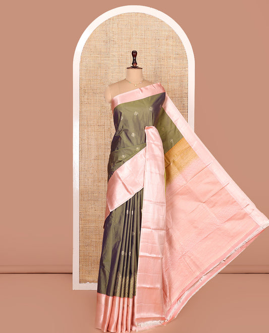 Green Budget Silk Saree, Subtly Sparkled with Zari Buttas All Over Its Body, Complemented by a Contrast Border of Traditional Zari Design Border, Intricately Designed Pallu, and Paired with a Contrast Blouse
