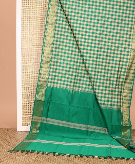 Green Checked Poly Cotton Saree, Highlighted by a Traditional Zari Design Border, Striped Pallu, and Paired with a Matching Blouse