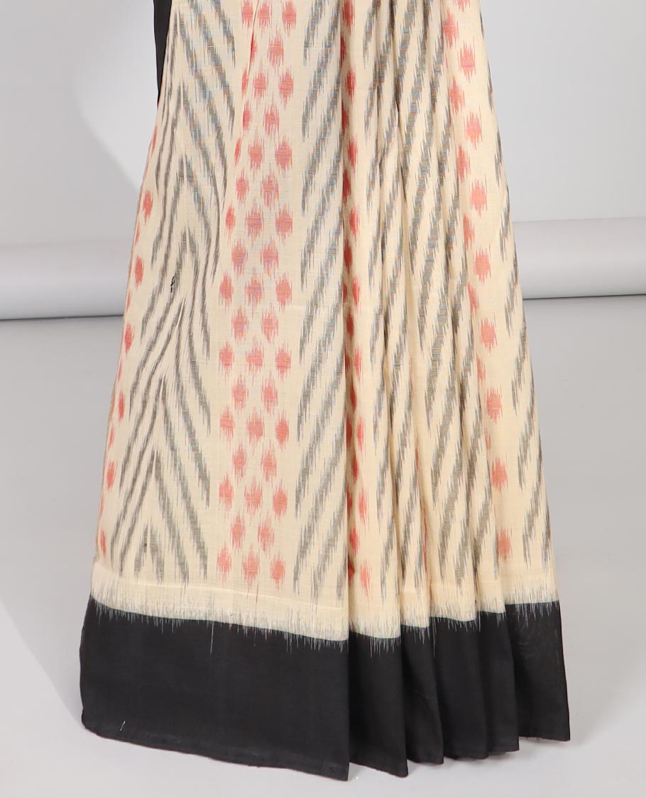Cream geometric design Ikkat cotton saree with contrast plain border & intricate butta design pallu