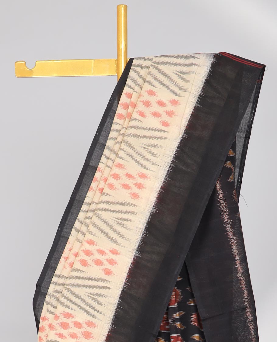 Cream geometric design Ikkat cotton saree with contrast plain border & intricate butta design pallu