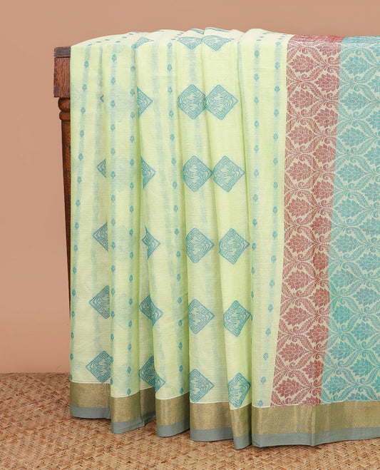 Green buttas kanchi cotton saree, contrast bavanji border, and pallu of ogee designs