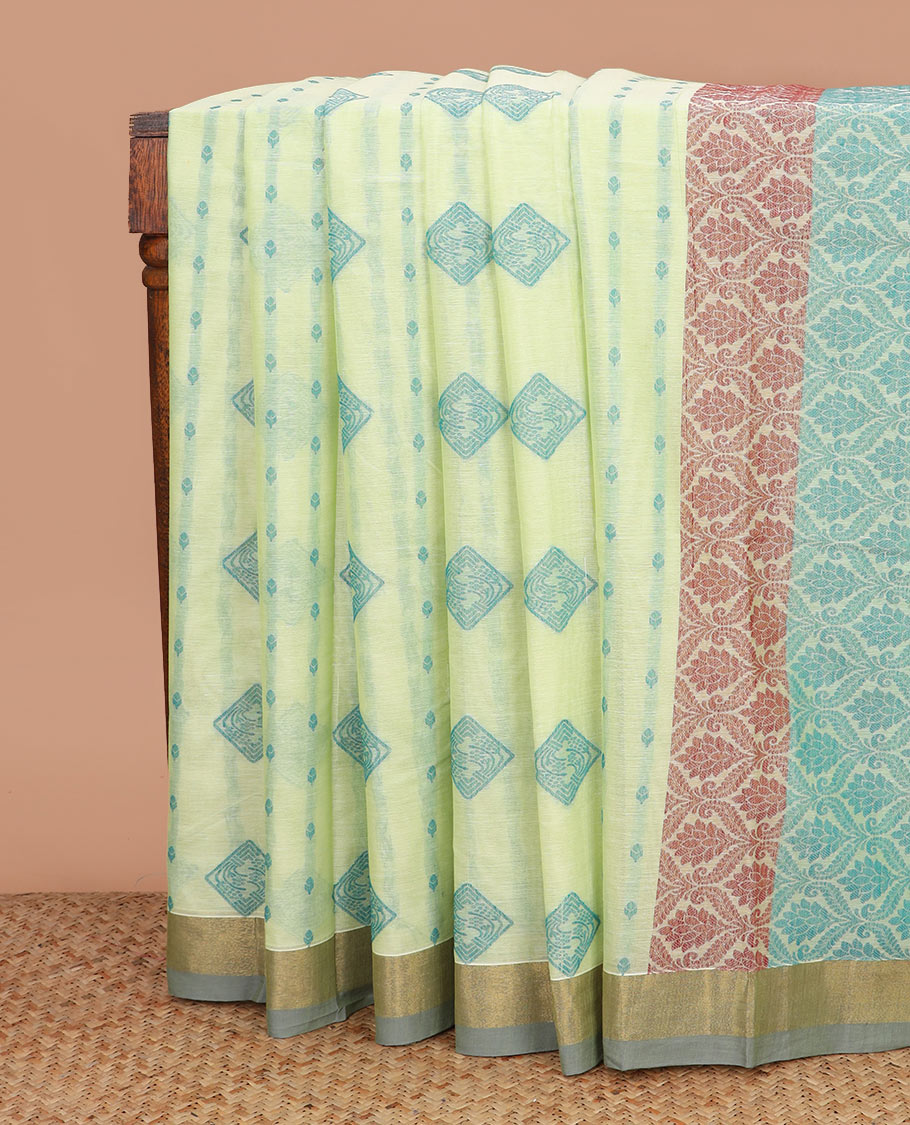 Green buttas kanchi cotton saree, contrast bavanji border, and pallu of ogee designs