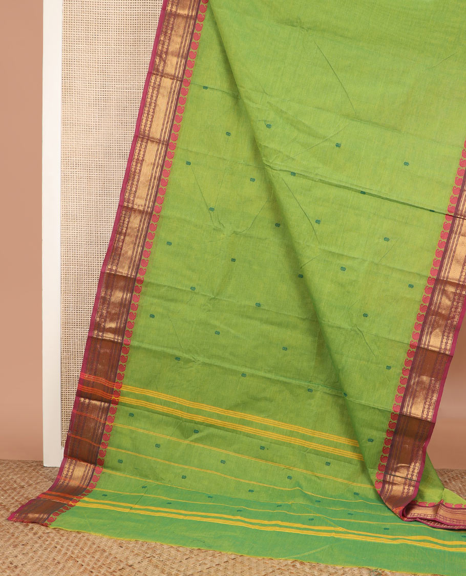 Green buttas Chettinad cotton saree, contrast traditional design border, and striped pallu