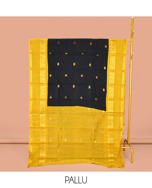Black Sungudi Cotton Saree, Prettified with Zari Buttas on Its Body, Complemented by a Contrast Retttai Pettu Traditional Zari Design Border, Zari-Design Pallu, and Paired with a Contrast Blouse