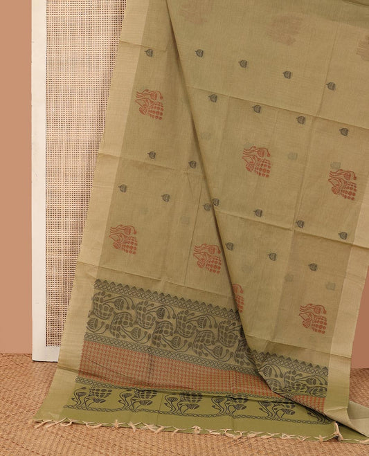 Green buttas Kanchi cotton saree, plain border, and pallu of floral design
