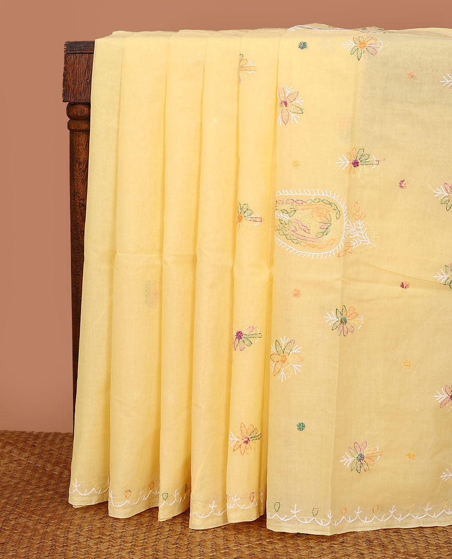 Light yellow colorful embroidered buttas Lucknowi chikankari saree, thread embroidered border, and floral-paisley motifs embroidered pallu