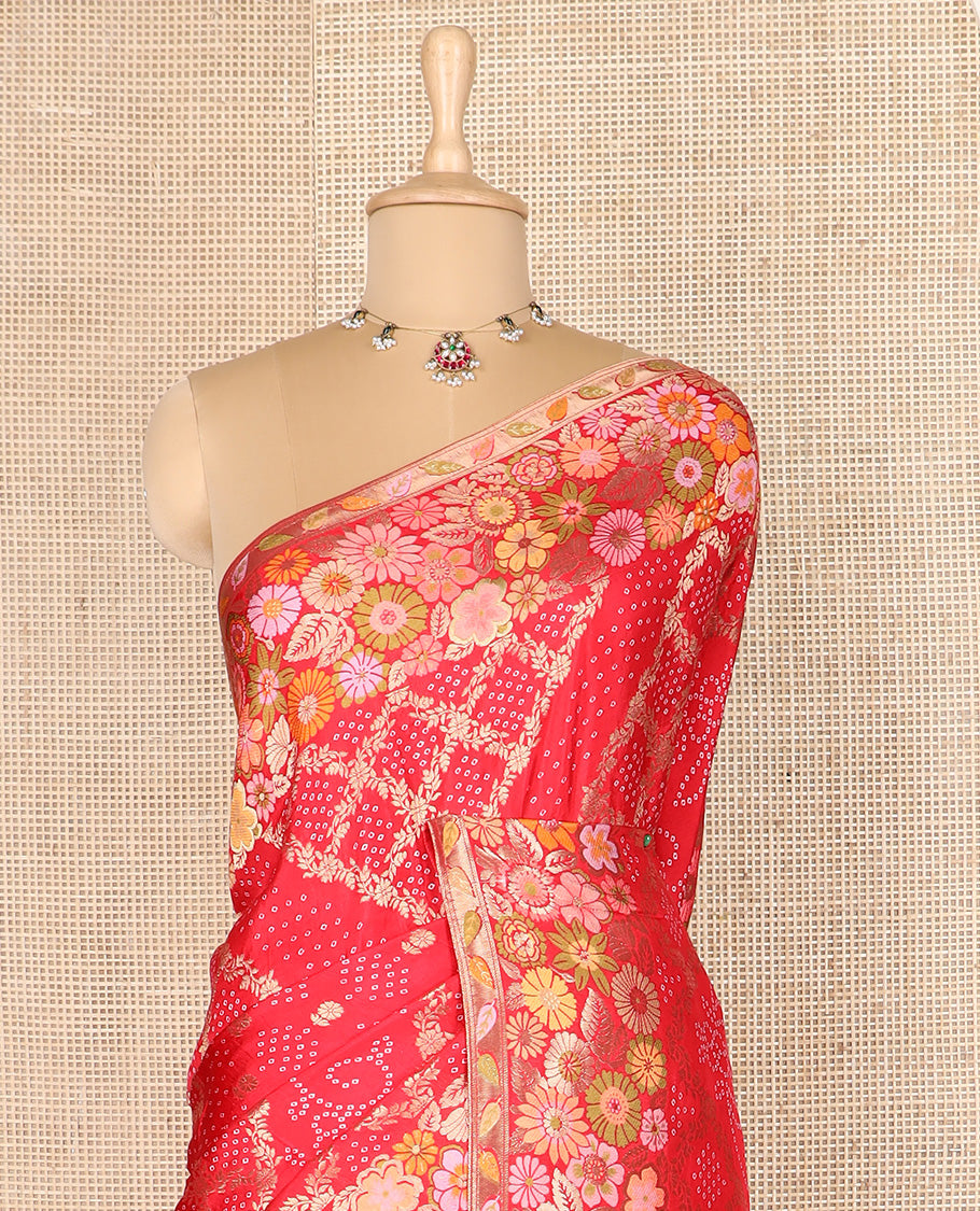 Red bandhani dottes with jaal design dola silk saree, meenakari floral design border, and pallu of bandhani dottes, and meenakari floral design