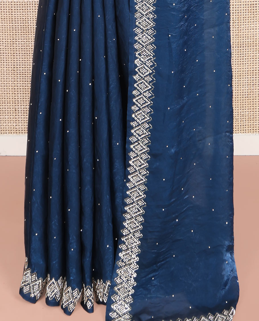 Blue Designer Saree, Accentuated with Stone Struck on Its Body, Highlighted by a Stone Embroidered Border, Self-Pallu, and Paired with a Matching Blouse