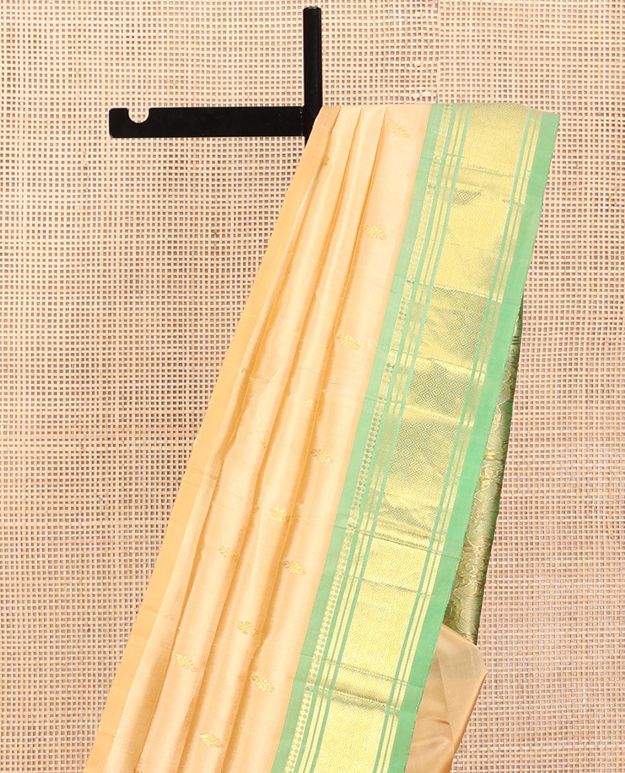 Sandal Kanchipuram Silk Saree, Accentuated with Buttas, a Contrast One-Sided Border of Panner Sombu, Banaras, and Jaal Design, Zari Design Pallu, and No Blouse