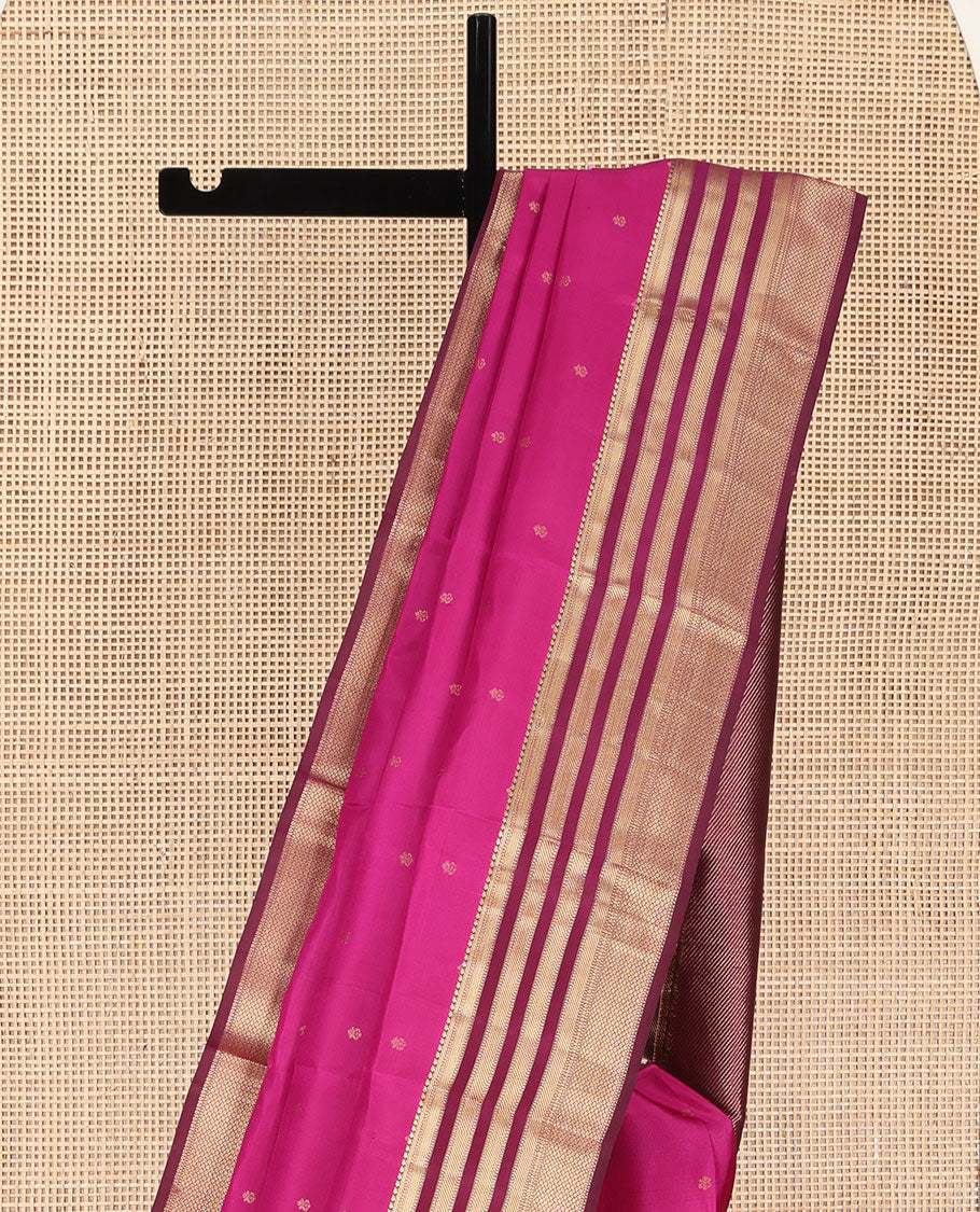 Pink Kanchipuram Silk Saree, Subtly Enriched with Zari Buttas All Over Its Body, Complemented by Contrast Border of Muthu, Banaras, and Mayil Kann Designs, Sparsely Striped Pallu, and Paired with a Contrast Blouse