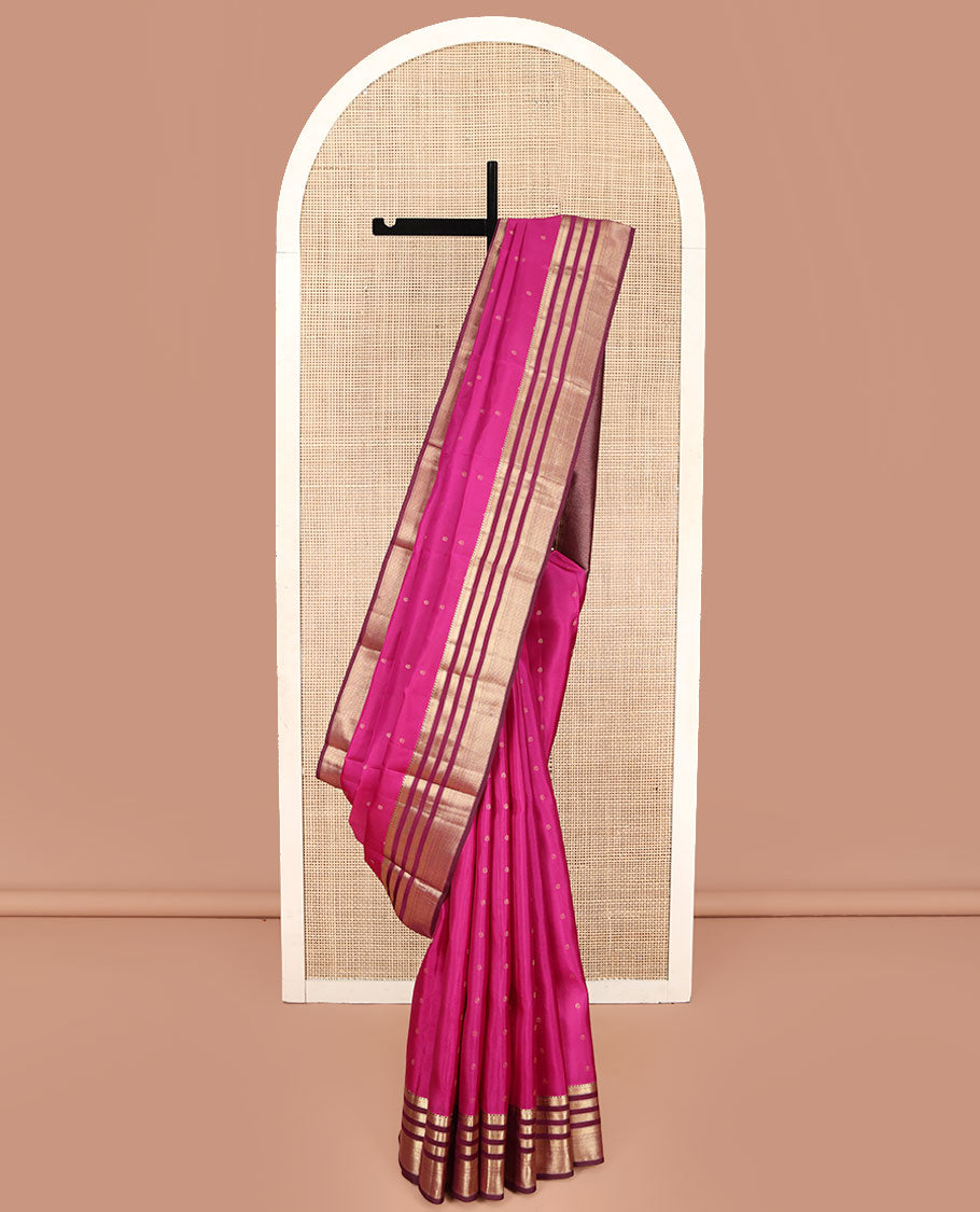 Pink Kanchipuram Silk Saree, Subtly Enriched with Zari Buttas All Over Its Body, Complemented by Contrast Border of Muthu, Banaras, and Mayil Kann Designs, Sparsely Striped Pallu, and Paired with a Contrast Blouse