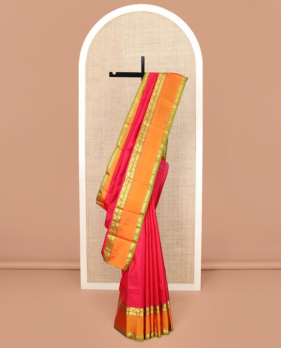 Red Striped Kanchipuram Silk Saree Spotlighted with Contrast Rettai Pettu Border Featuring Thazampoo Rekku, Manga, Banaras, and Rudraksham Designs, a Subtle Striped Pallu, and a Contrast Blouse