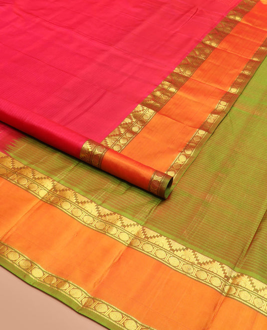 Red Striped Kanchipuram Silk Saree Spotlighted with Contrast Rettai Pettu Border Featuring Thazampoo Rekku, Manga, Banaras, and Rudraksham Designs, a Subtle Striped Pallu, and a Contrast Blouse