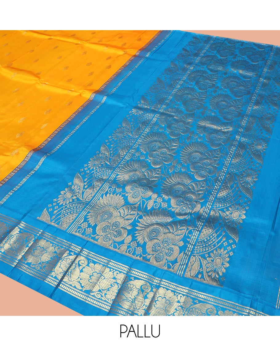 Yellow Kanchipuram Silk Saree Sparsely Sparkled with Zari Buttas All Over Its Body, Complemented by a Contrast One-Sided Korvai Border of Banaras, Muthu, Manga, and Floral Designs, Pallu of Floral Designs, and Comes Without a Blouse