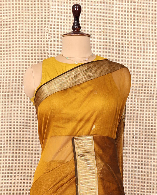 Mustard Maheshwari Cotton Saree, Woven with Floral Buttas on Its Body, Highlighted by a Zari Border of Traditional Designs, Pallu Steeped with Buttas, and Paired with a Matching Blouse
