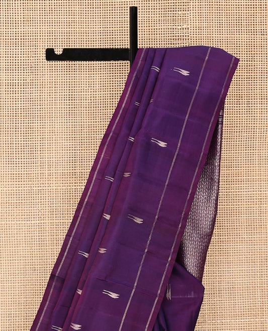 Purple Mayuri Soft Silk Saree, Detailed with Malli Mokku Buttas All Over Its Body, Subtly Woven Border, Grand Pallu Steeped with Manga Designs, and Paired with a Matching Blouse