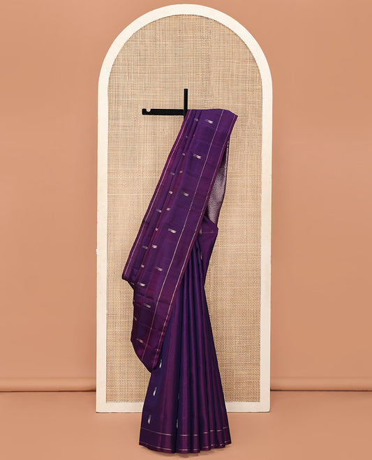 Purple Mayuri Soft Silk Saree, Detailed with Malli Mokku Buttas All Over Its Body, Subtly Woven Border, Grand Pallu Steeped with Manga Designs, and Paired with a Matching Blouse
