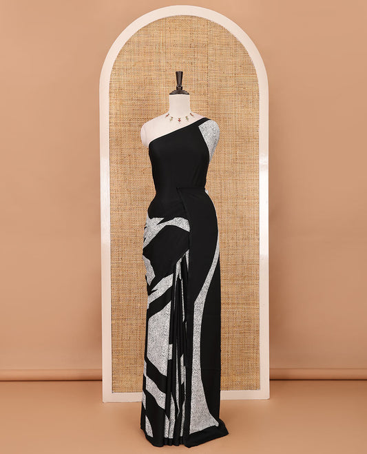 Borderless black abstract-style & leopard-skin-style printed satin crepe saree, plain black blouse