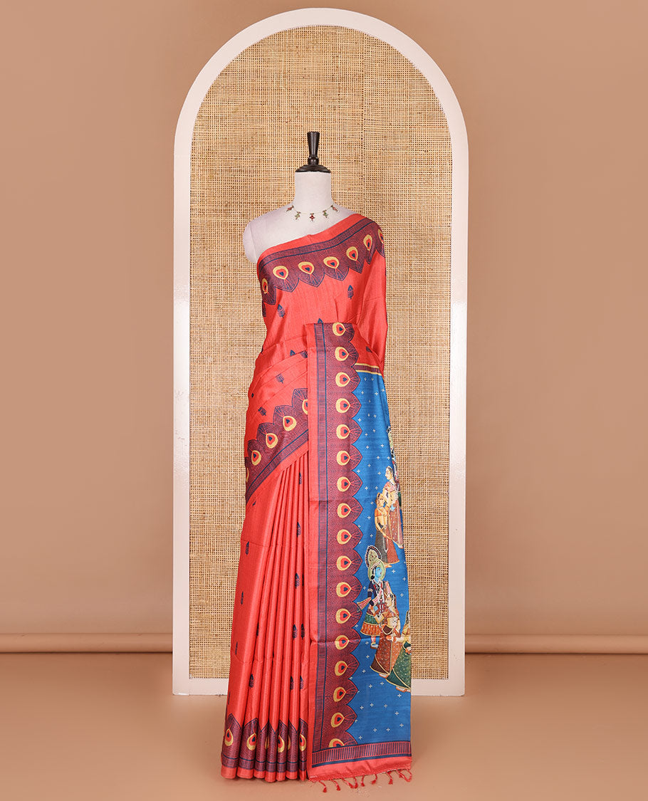 Tomato pink peacock feathers motifs printed katan silk saree, peacock feathers printed border, contrast Radha Krishna stories printed pallu, and contrast printed blouse