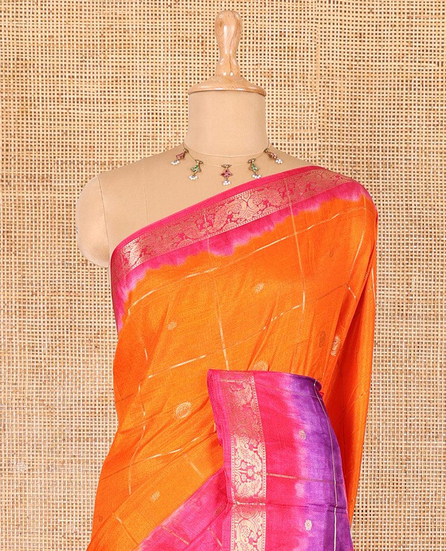 Orange buttas enclosed checked dola silk saree, contrast shibori print with traditional zari border, buttas enclosed checked pallu, and a contrast buttas enclosed checked blouse