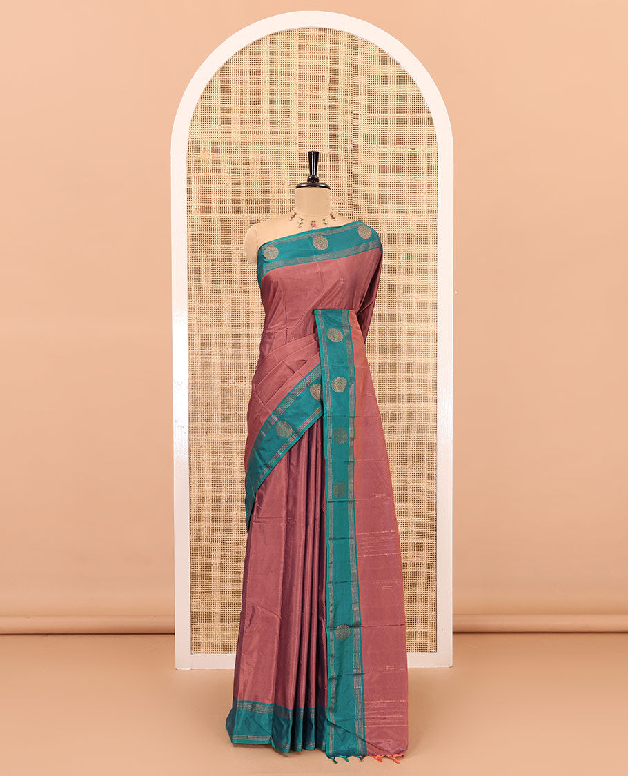 Peach zari buttas semi-soft silk saree, contrast zari buttas and striped border, striped pallu, and a plain blouse